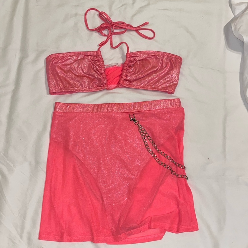 Two-piece pink rave set. Skirt and top.
